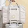 Merkloos Reistas - Handbagage Tas - Opvouwbaar - Beige - Off White - Travelbag -Trolley Winkel 912x1200